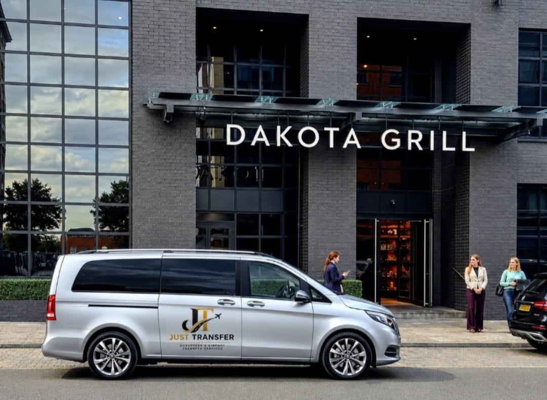 Silver Mercedes Vito 8-seater executive minibus outside Dakota Manchester